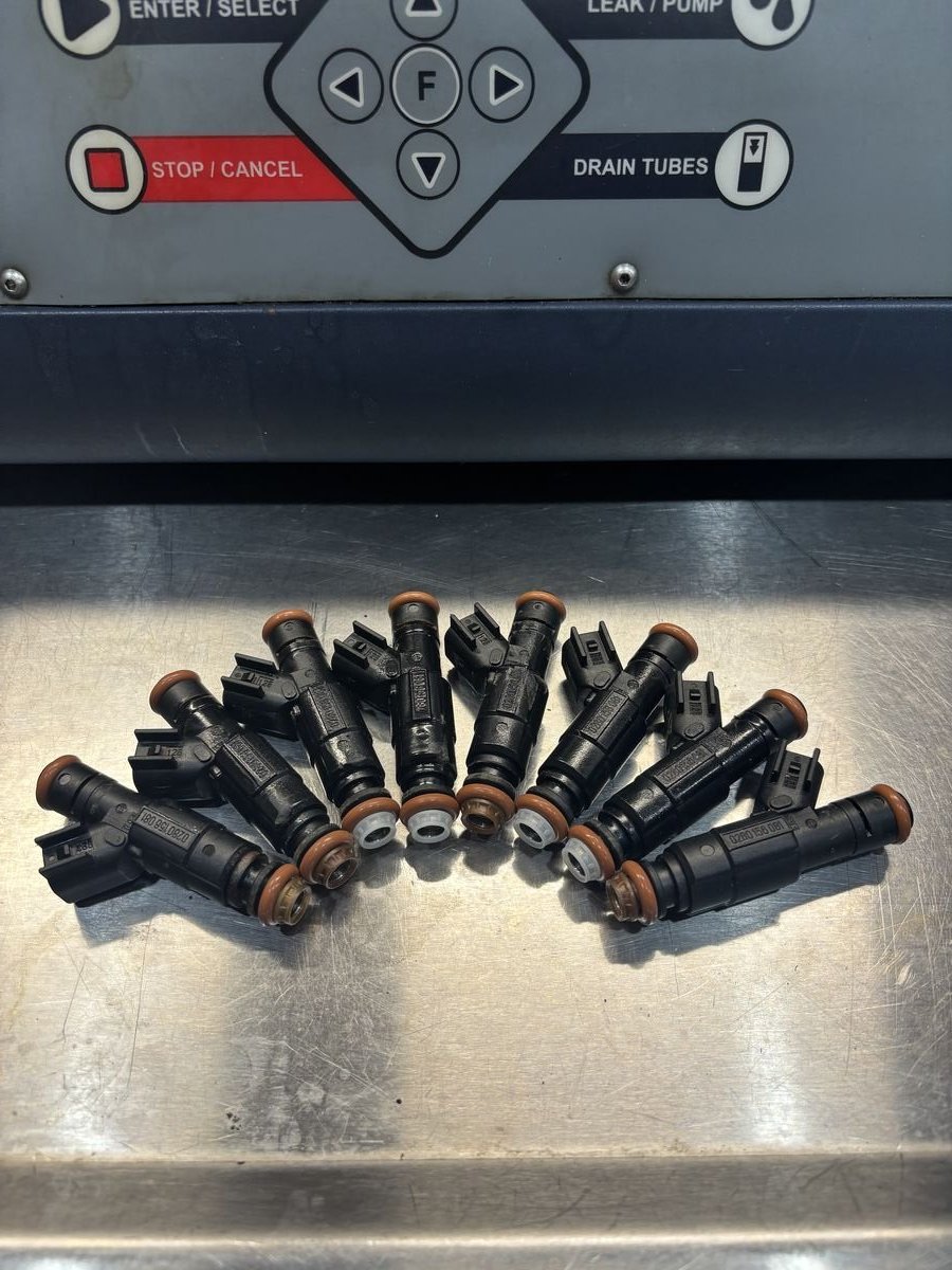 Batch of fuel injectors ready for cleaning
